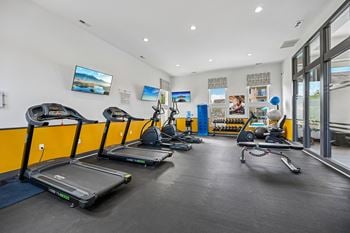 Onsite 24-hour fitness center with free weights